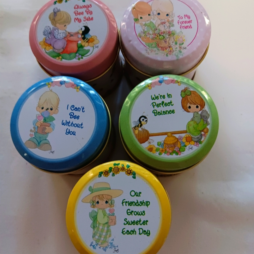 Precious moments lot of 5 candles in tins